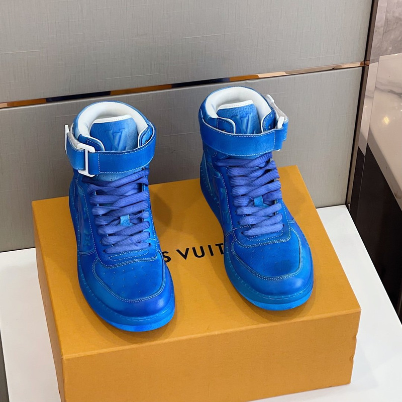 l**is V*t*n embossed monogram high-top sneaker blue