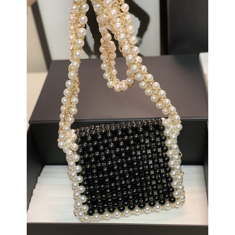 Ch*el handmade imitation pearl woven bag black and white