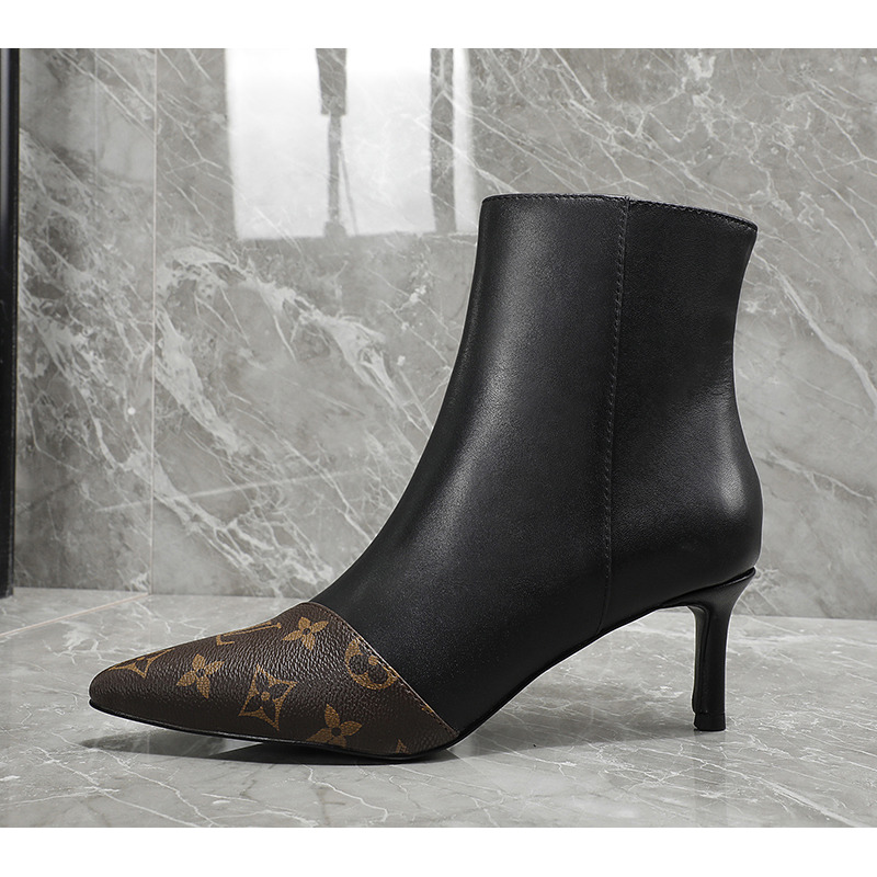 l**is V*t*n logo print ankle boots