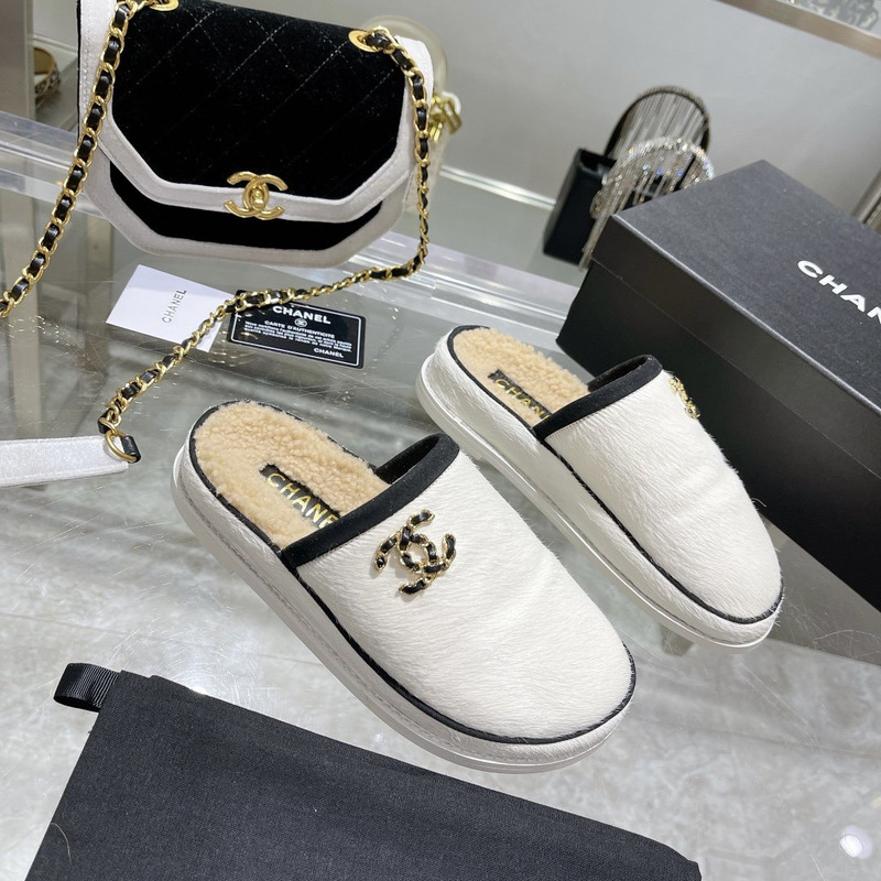 Ch*el pony style calfskin mules white