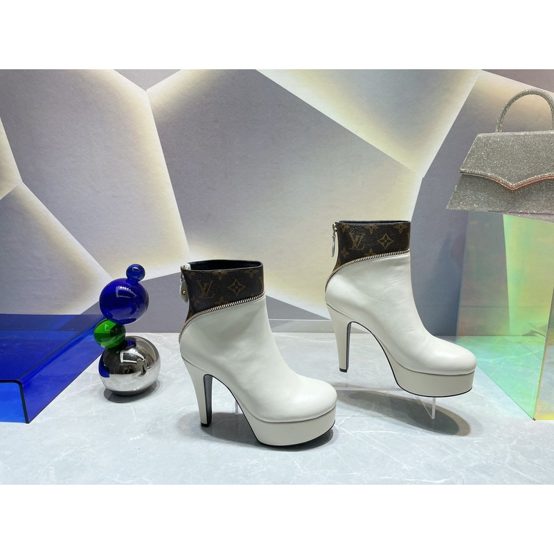 l**is V*t*n afterglow platform ankle boots white