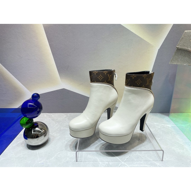 l**is V*t*n afterglow platform ankle boots white