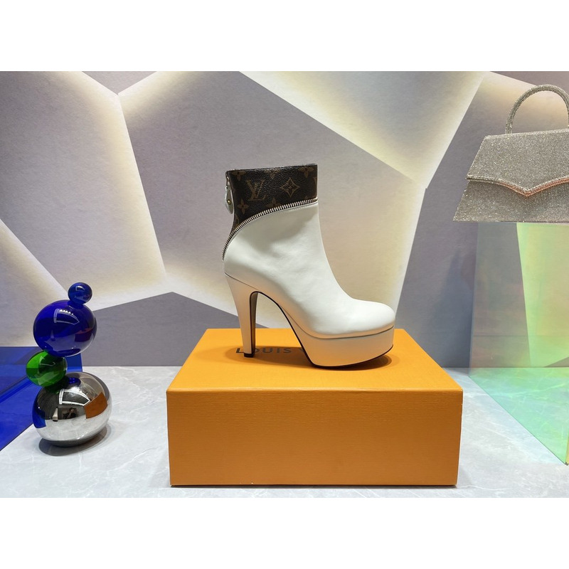 l**is V*t*n afterglow platform ankle boots white