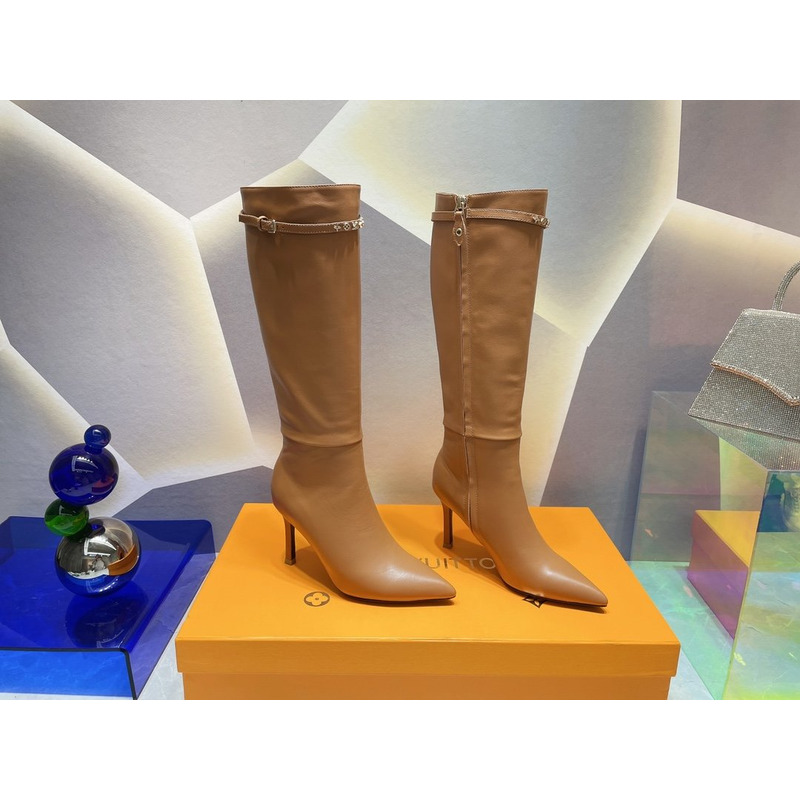 l**is V*t*n women’s signature high boots brown