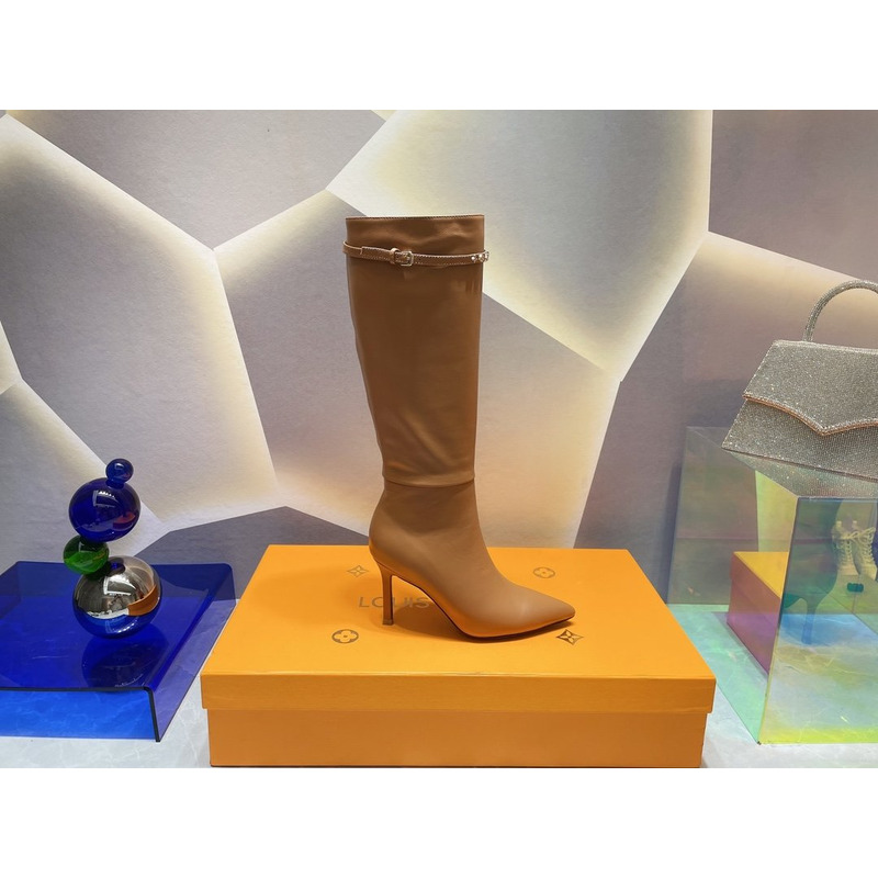 l**is V*t*n women’s signature high boots brown