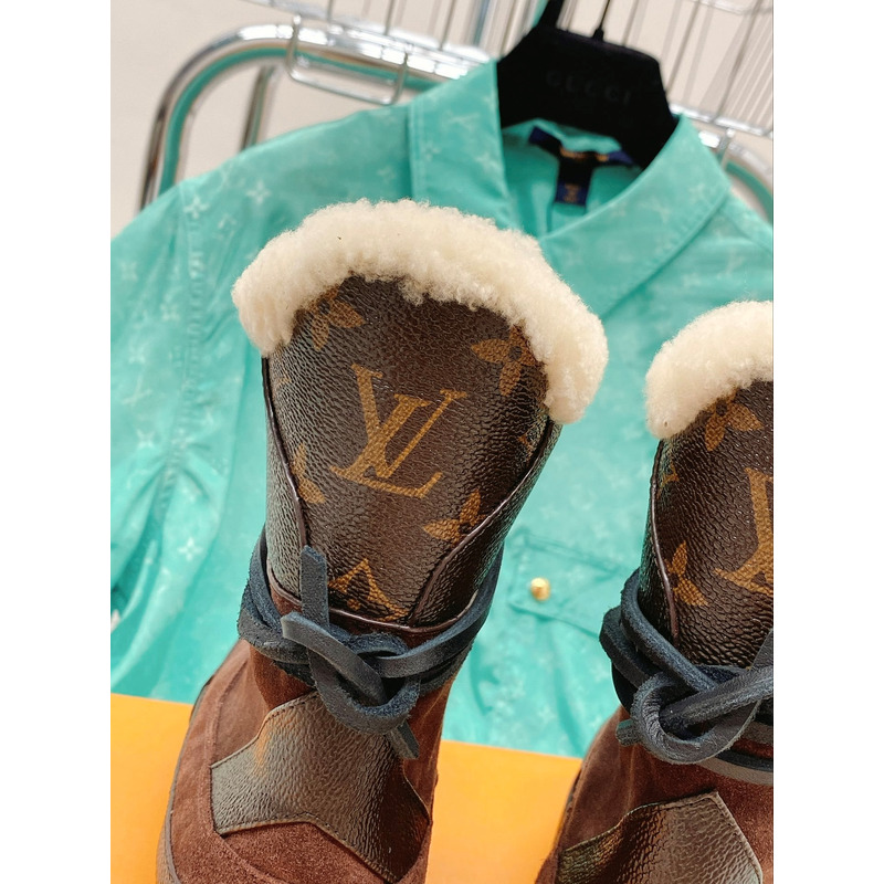 l**is V*t*n laureate monogram platform boots brown