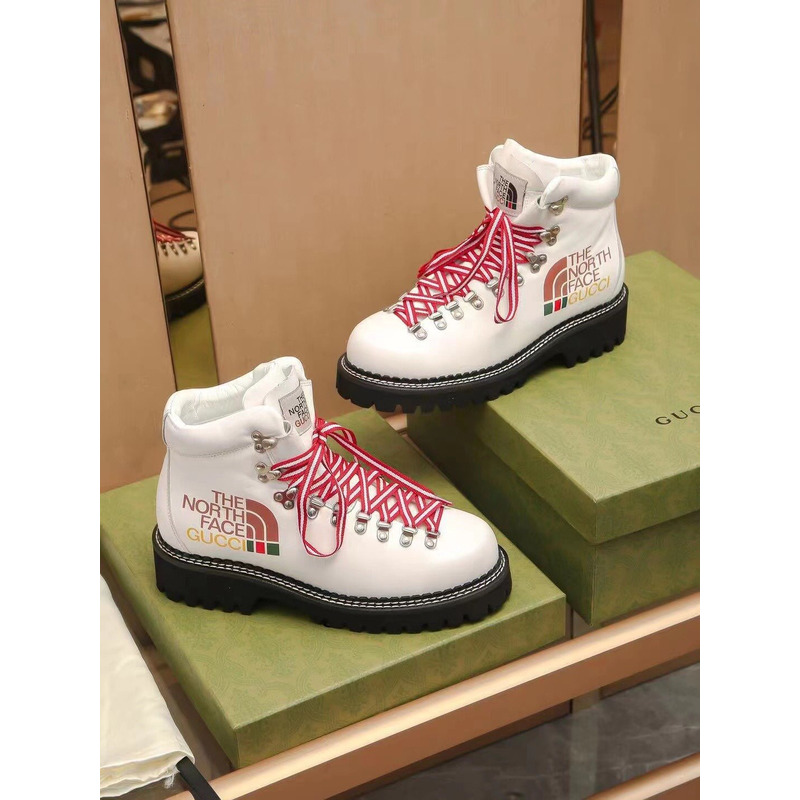 g*u*i x the n0*h F**e leather ankle boots white