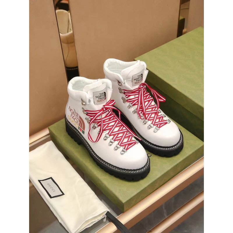 g*u*i x the n0*h F**e leather ankle boots white