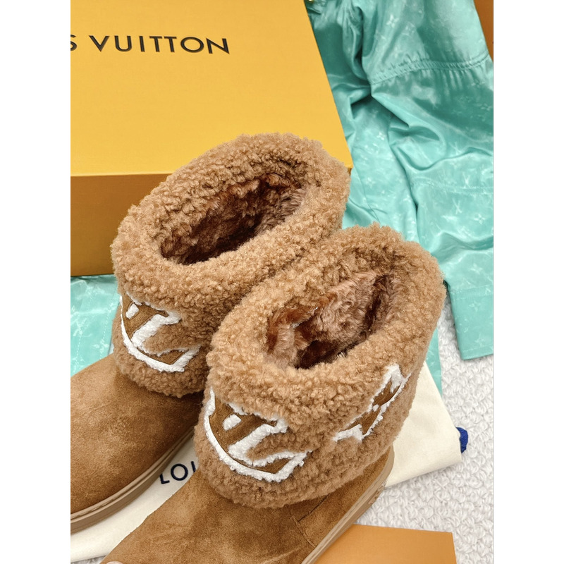 l**is V*t*n snowdrop flat ankle boots cognac