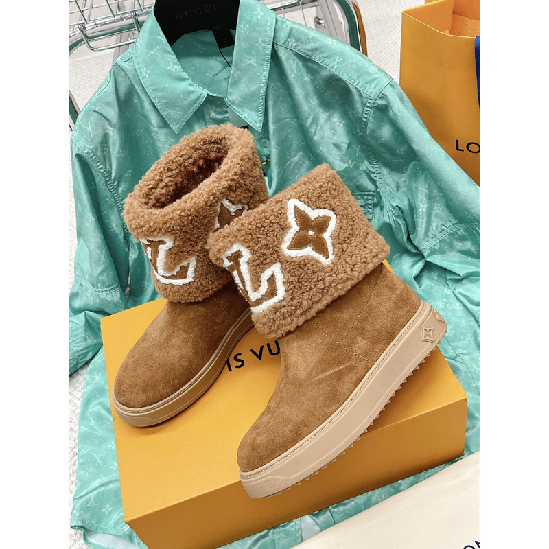 l**is V*t*n snowdrop flat ankle boots cognac