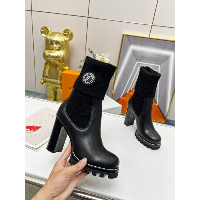 l**is V*t*n star trail ankle boots black