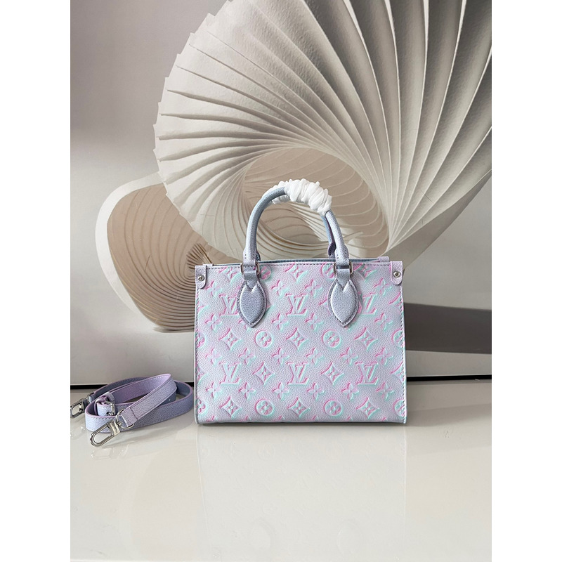 l**is V*t*n  green, and blue summer stardust onthego pm silver hardware