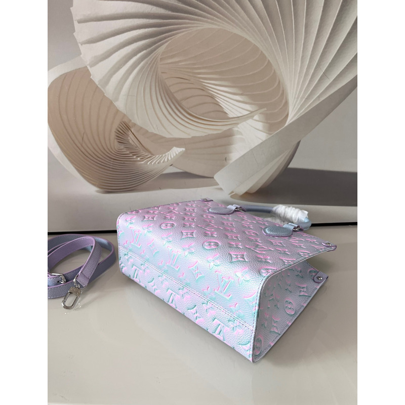 l**is V*t*n  green, and blue summer stardust onthego pm silver hardware