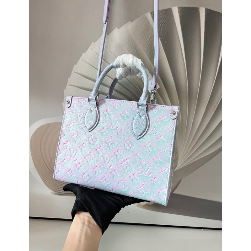 l**is V*t*n  green, and blue summer stardust onthego pm silver hardware