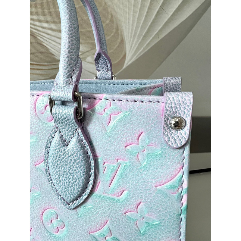 l**is V*t*n  green, and blue summer stardust onthego pm silver hardware