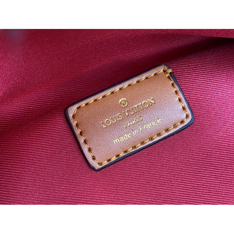 l**is V*t*n monogram shearling bumbag black with red logo