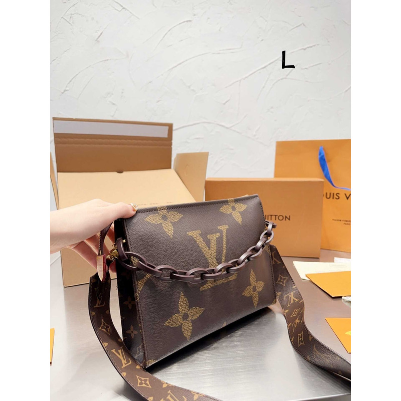 l**is V*t*n toiletry bag with logo