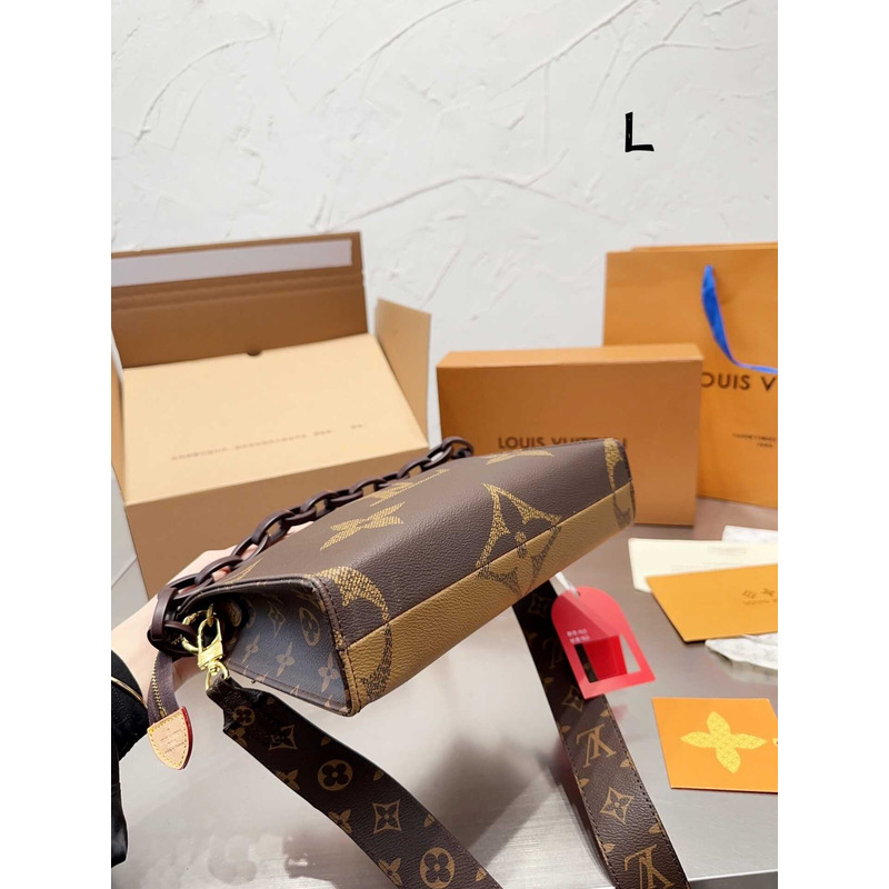 l**is V*t*n toiletry bag with logo