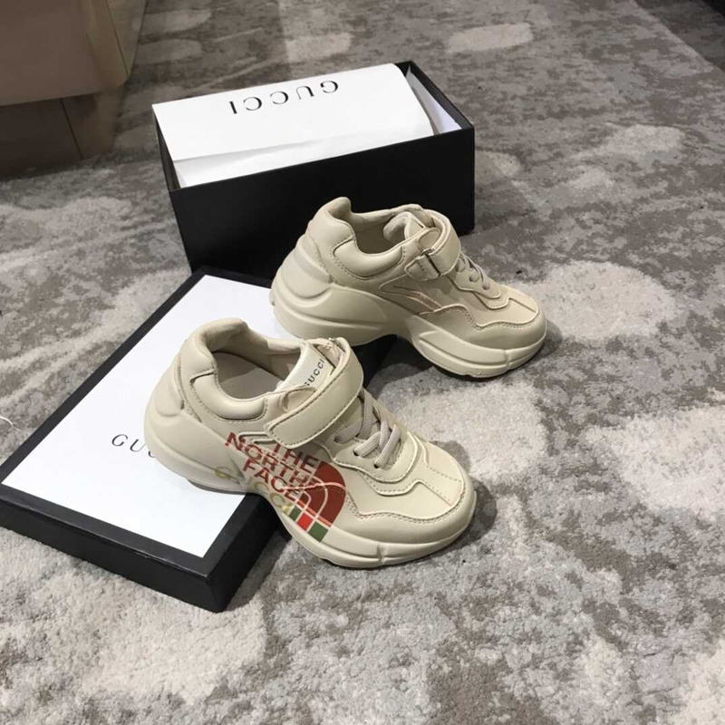 g*u*i x the n0*h F**e kids sneakers