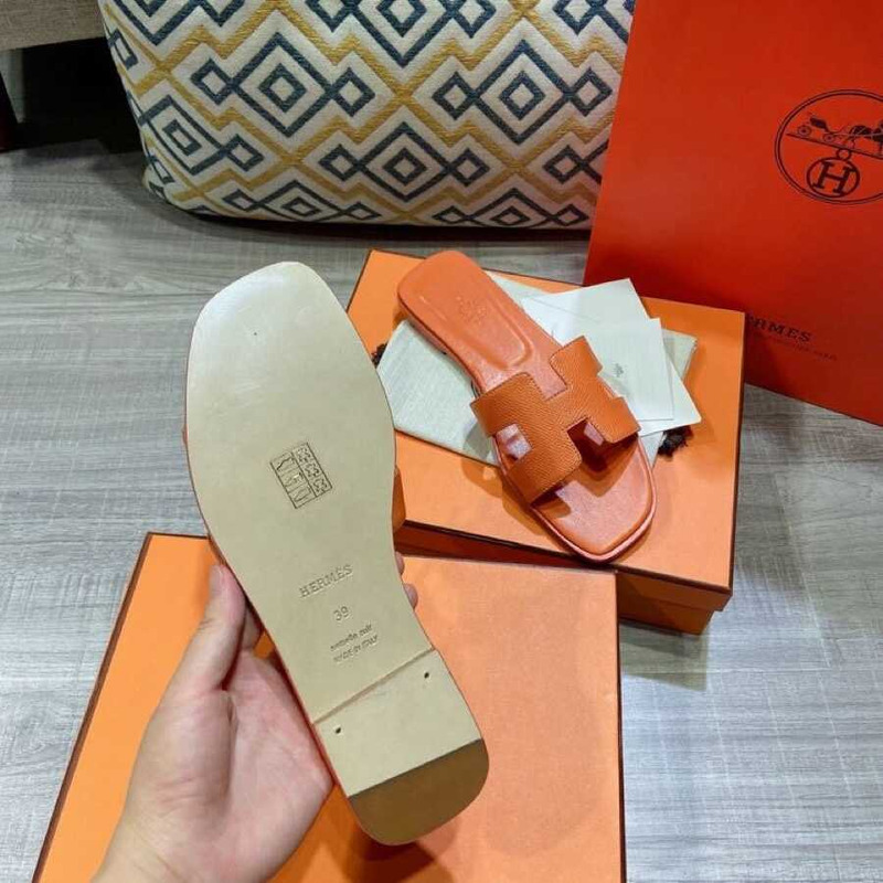 H**mes orange leather sandal