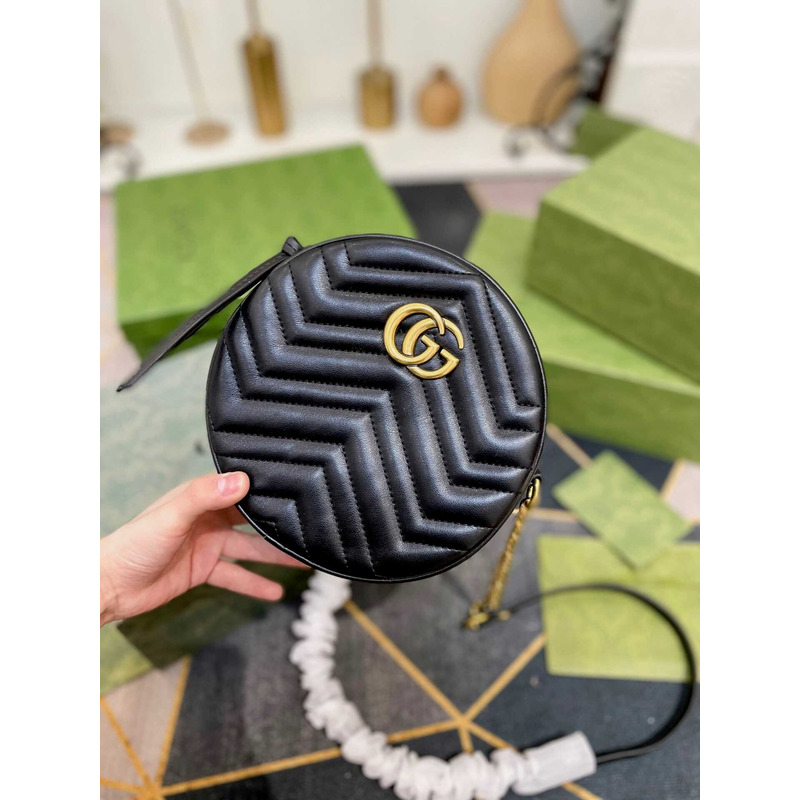 G*u*i black marmont round cross bag