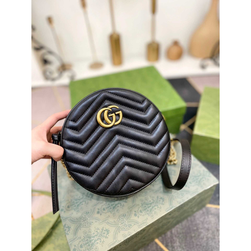 G*u*i black marmont round cross bag