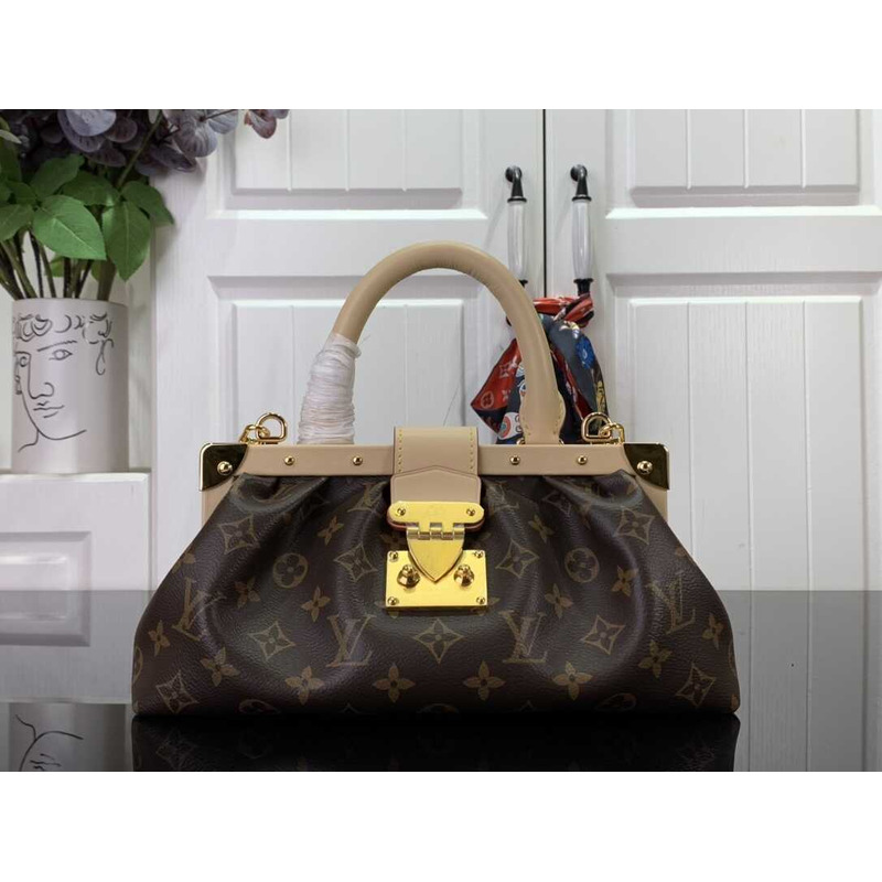 l**is V*t*n monogram clutch