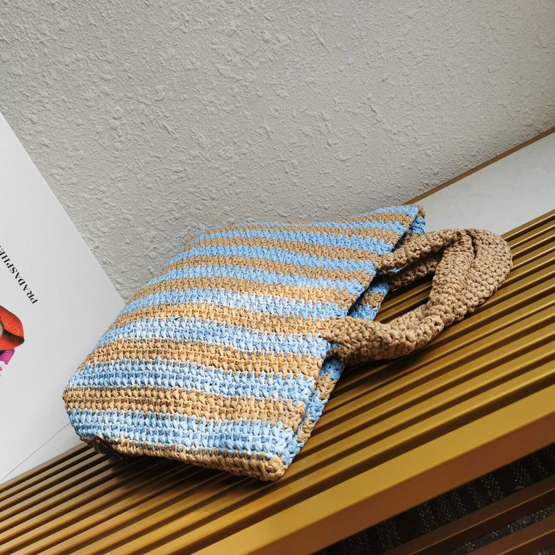 Pra*a large raffia tote bag tan/light blue