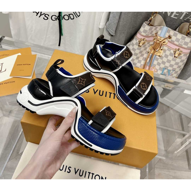 l**is V*t*n archlight sandal black and blue