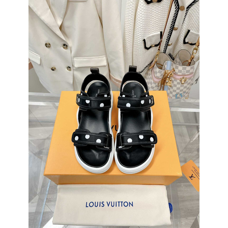 l**is V*t*n archlight sandal black and white