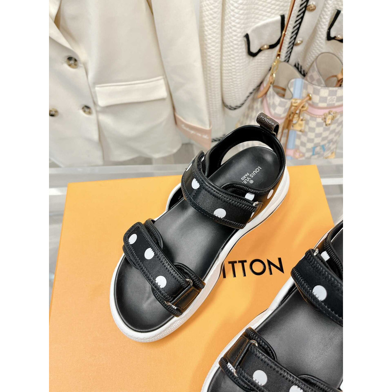 l**is V*t*n archlight sandal black and white