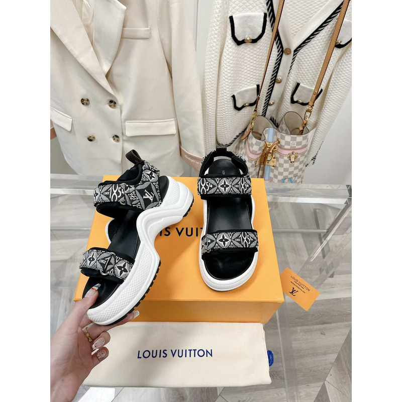 l**is V*t*n archlight sandal black and white