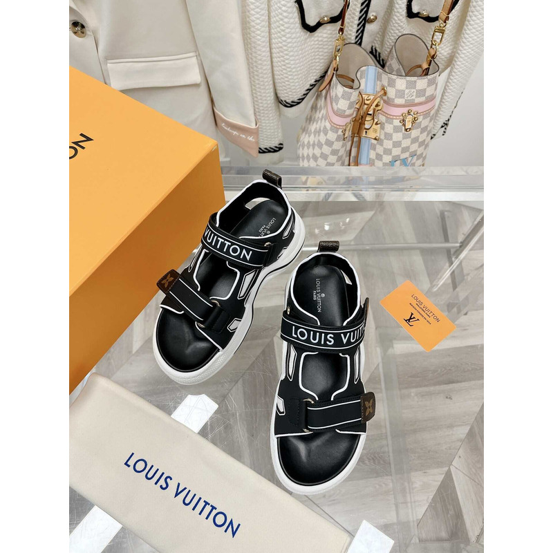 l**is V*t*n archlight sandal black and white