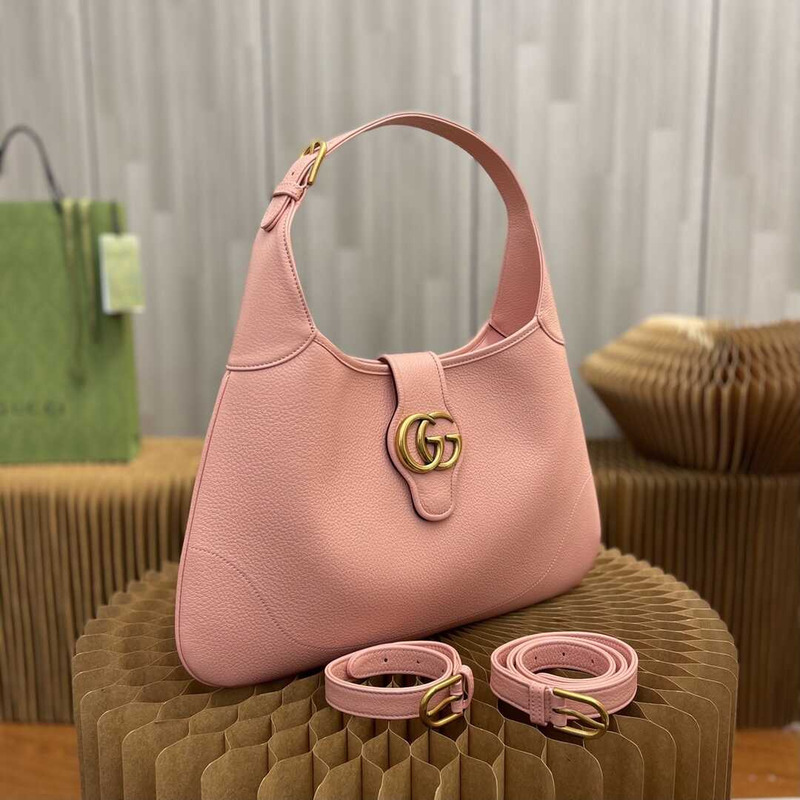 G*u*i aphrodite medium crescent shoulder bag pink