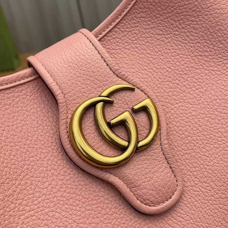 G*u*i aphrodite medium crescent shoulder bag pink