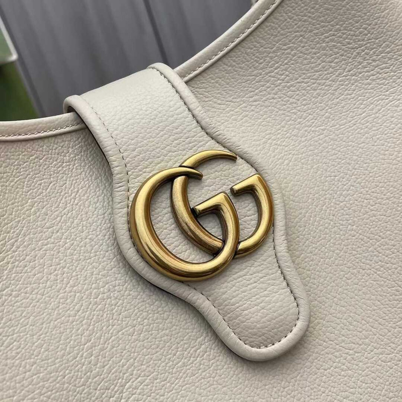 G*u*i aphrodite medium crescent shoulder bag white