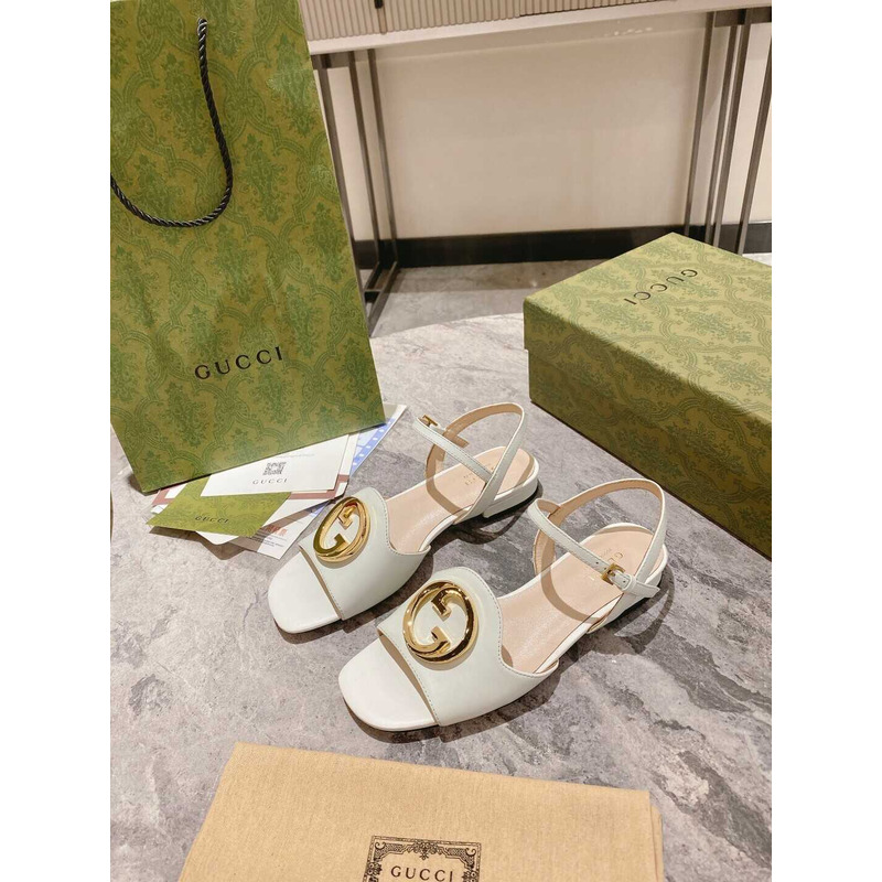 G*u*i logo-plaque leather sandals white