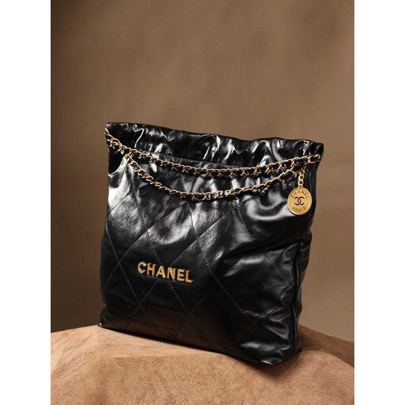 Ch*el 22 handbag black shiny calfskin & gold-tone metal