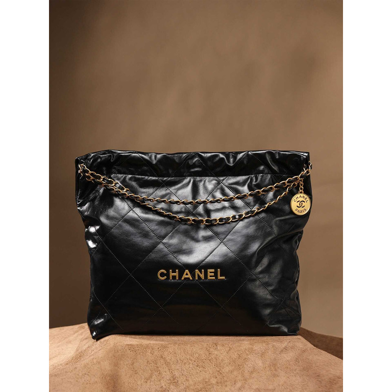 Ch*el 22 handbag black shiny calfskin & gold-tone metal