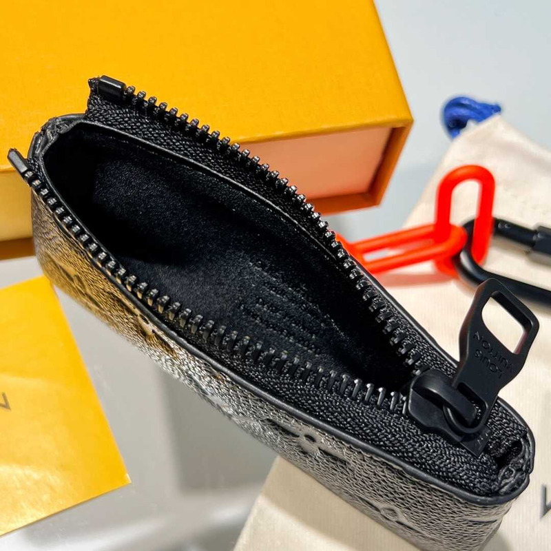 l**is V*t*n pochette cles monogram orange black