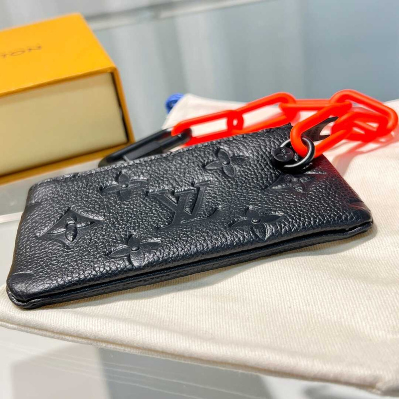 l**is V*t*n pochette cles monogram orange black