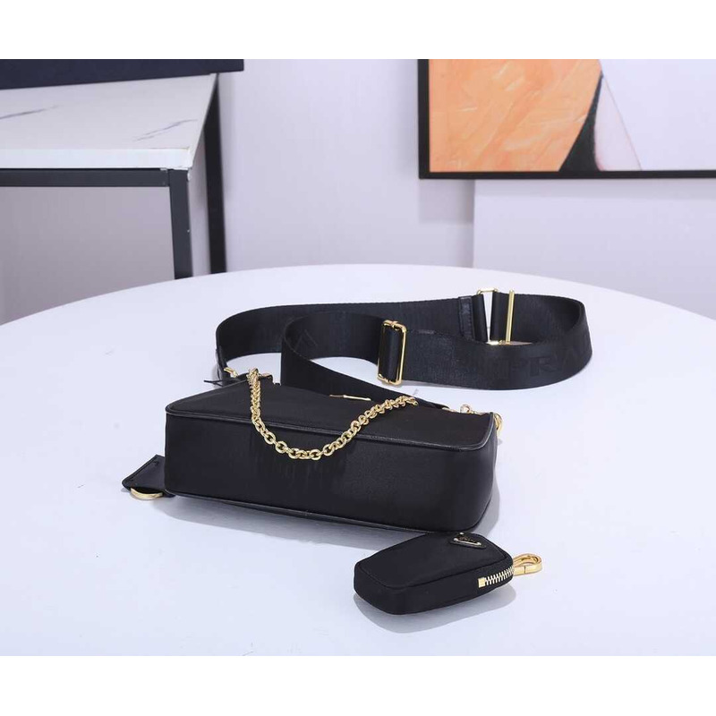 Pra*a black re-nylon bag gold hardware