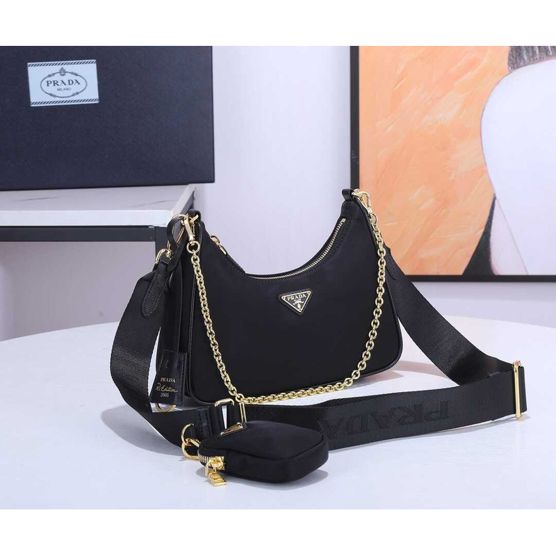 Pra*a black re-nylon bag gold hardware