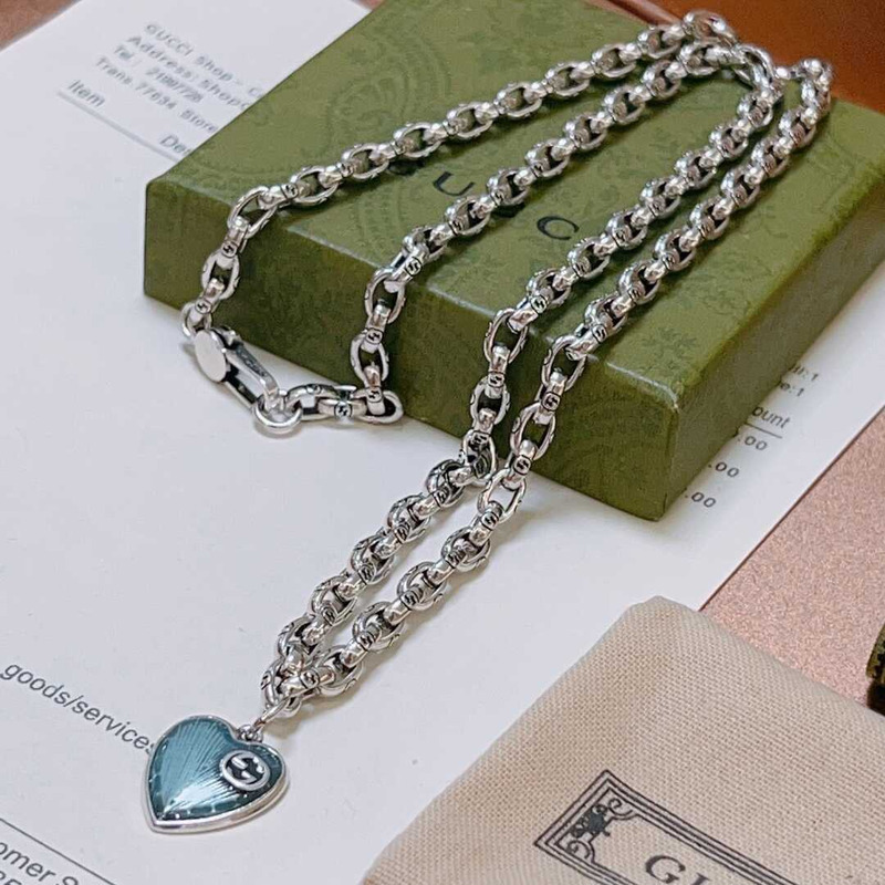 G*u*i blue heart necklace