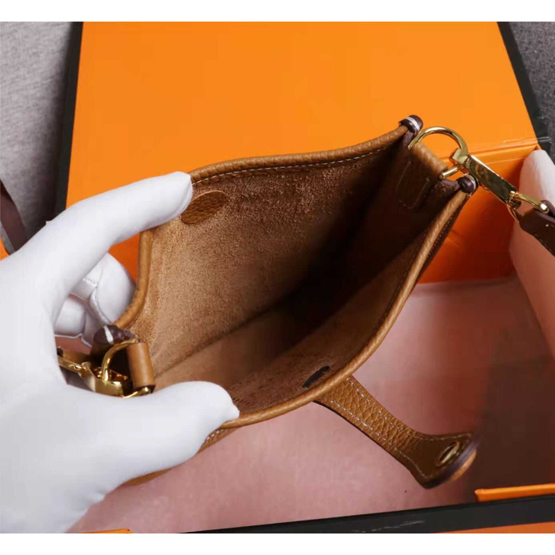 H**mes evelyne tpm mini gold a stamp bag