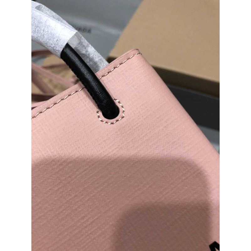 Ba*len*cia*ga textured calfskin logo shopping phone holder bag nude pink