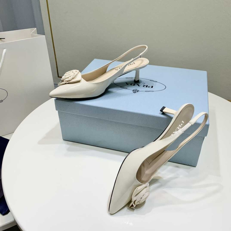 Pra*a white patent leather slingback