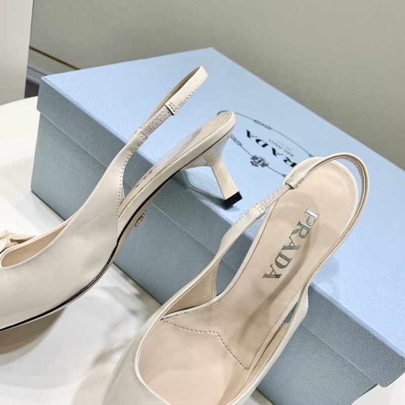 Pra*a white patent leather slingback