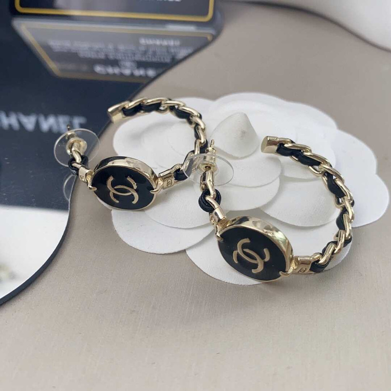 Ch*el metal cc earrings gold and black
