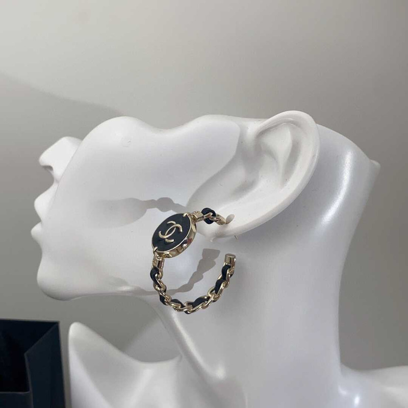 Ch*el metal cc earrings gold and black